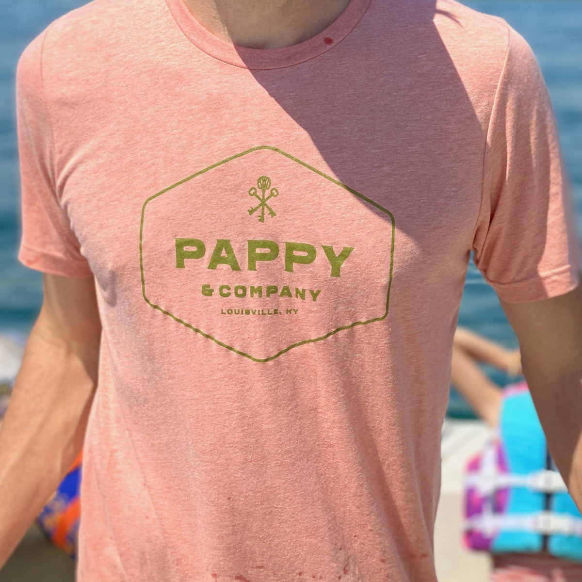 Unisex T-shirt Pappy & Company Enclosed Logo in Sunset Coral Tri-blend
